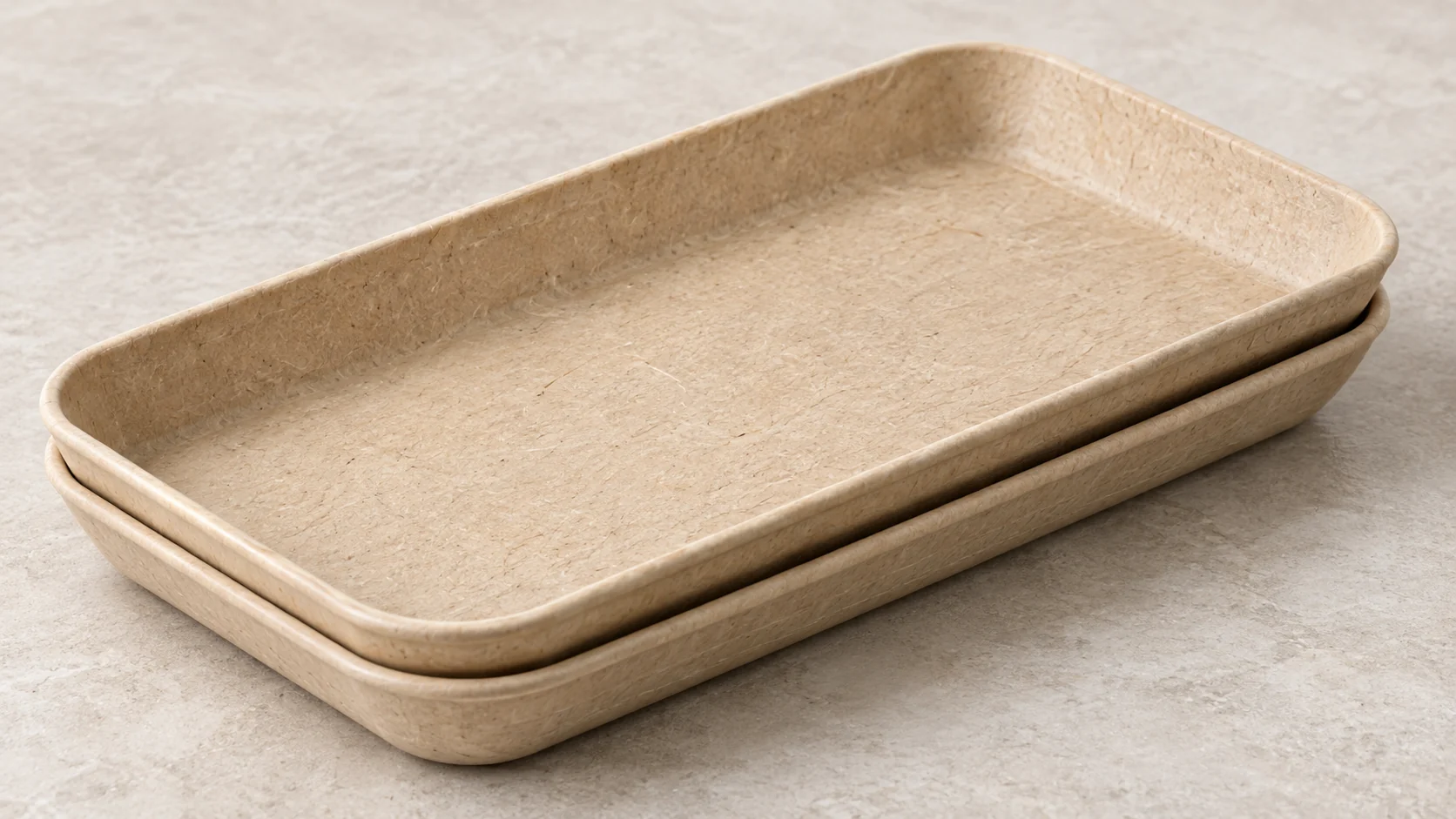 Two nested natural rectangular trays